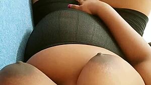 A Sri Lankan beauty exposes her big melons in a bikini.