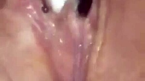 Hot wife masturbates with dildo, fingering herself passionately