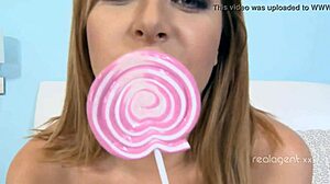 russian blonde beauty teasing with candy, what happens next?