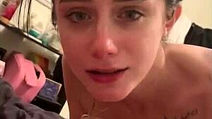 In this amateur scene, a skinny teen slut eagerly sucks on a big cock, her lips wrapped tightly around it.