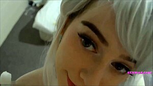 young pretty woman strips to show big tits