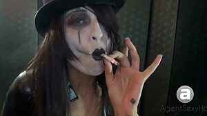 goth girl smokes while showing big tits fetish
