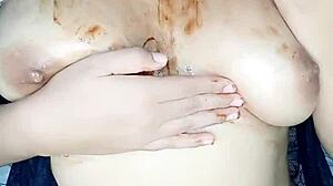 Curvy girl touches her big ass and tits alone