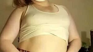 Amateur performs promotional tit reveal for free videos