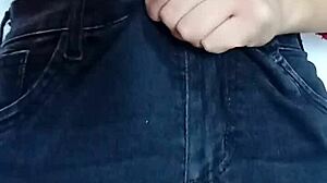 Playing rough with a belt spanking my bare tits