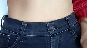 Playing rough with a belt spanking my bare tits