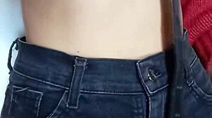 Playing rough with a belt spanking my bare tits