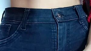 Playing rough with a belt spanking my bare tits