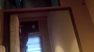 Ebony cowgirl rides in black setting with intriguing contrast