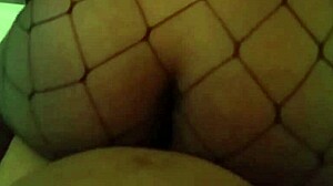 Ebony cowgirl rides in black setting with intriguing contrast