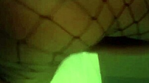 Ebony cowgirl rides in black setting with intriguing contrast