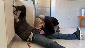 wife performs oral on plumber in kitchen
