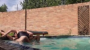 Natural tits and a big dick in a hot pool scene
