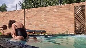 Natural tits and a big dick in a hot pool scene