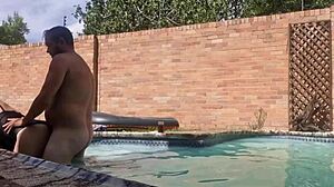 Natural tits and a big dick in a hot pool scene