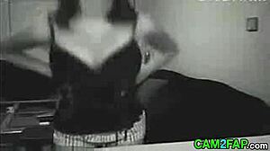A teen webcam girl performs in a free video
