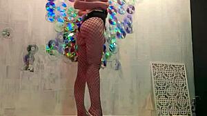 passionate beauty masturbates to crazy orgasm after christmass photoshoot