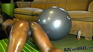 ebony freak rides oiled exercise ball suggestively