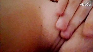 Slut fingers her perfect pussy