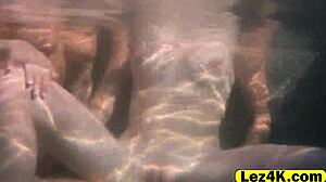 Gorgeous lesbians share wet kisses in steamy pool