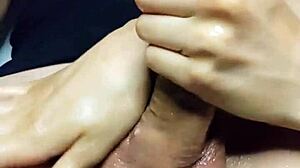 Oiled Handjob Leads To Massive Cum Bust