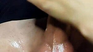 Oiled Handjob Leads To Massive Cum Bust