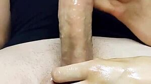 Oiled Handjob Leads To Massive Cum Bust