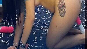 Girl pleasures pussy with two dildos