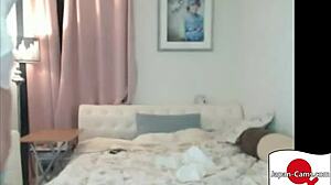 Japanese girl performs a striptease on webcam