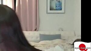 Japanese girl performs a striptease on webcam