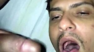 Negro shoves black dick in mouth.