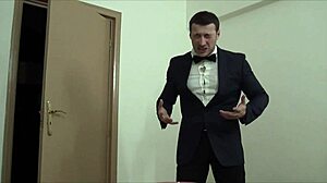 The waiter hulk is masturbating, his muscular bodybuilder form on display for all to see.