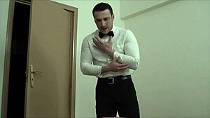 The waiter hulk is masturbating, his muscular bodybuilder form on display for all to see.