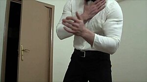 The waiter hulk is masturbating, his muscular bodybuilder form on display for all to see.