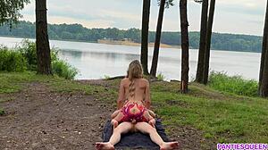 Look at this naked blonde riding hard outside in public, cumshot on her tits!