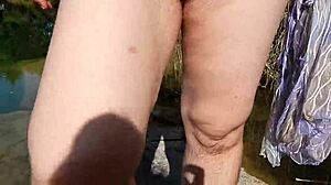 Hairy wife flashes nude outdoors in public. Her chubby frame draws stares under the open sky.