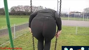 look at this mature milf walking in the park with huge ass in leggings