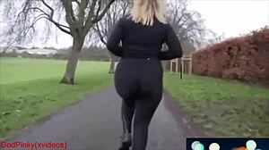 look at this mature milf walking in the park with huge ass in leggings