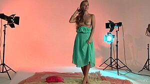 teen model with golden hair strips nude for photoshoot