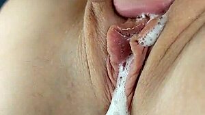 Clit licking causes explosive squirting orgasm close up