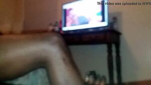 Ebony babe sucks and licks black cock.