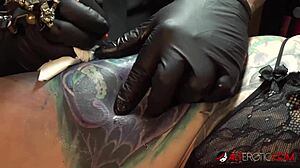 marie bossette touches herself during a tattoo session