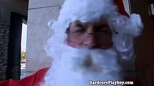 amateur elf babe in costume meets santa for a fun storyline