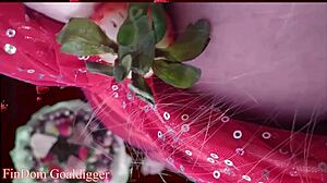 Financial dominatrix in glasses masturbates with food fetish domination