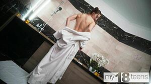 Pretty teen Nika's solo session in the steamy bathroom