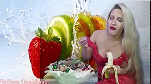 Financial dominatrix in glasses masturbates with food fetish domination