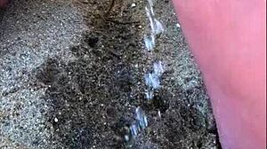 I watch my wife pee long on the beach