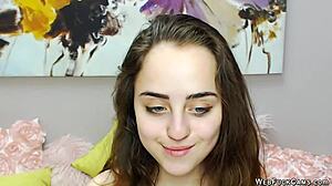 Cute brunette babe subtly plays with her vibrator on webcam