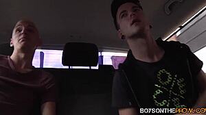Twinks hook up in vehicle for wild threesome action