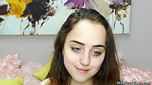 Cute brunette babe subtly plays with her vibrator on webcam